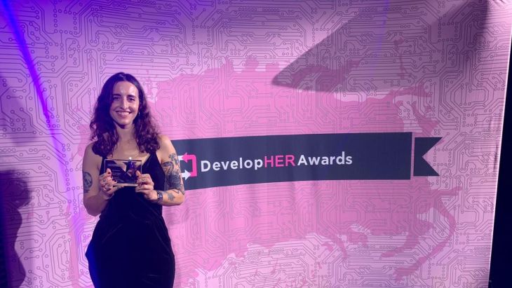 Elle accepting her award at the DevelopHER awards ceremony